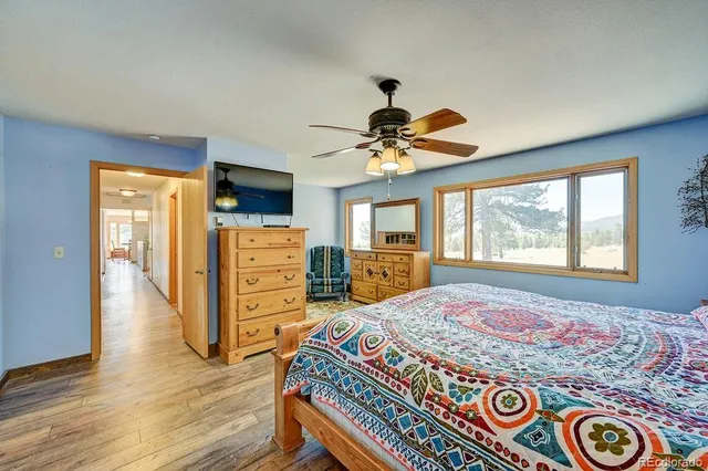 a kitchen with a sink and a refrigerator