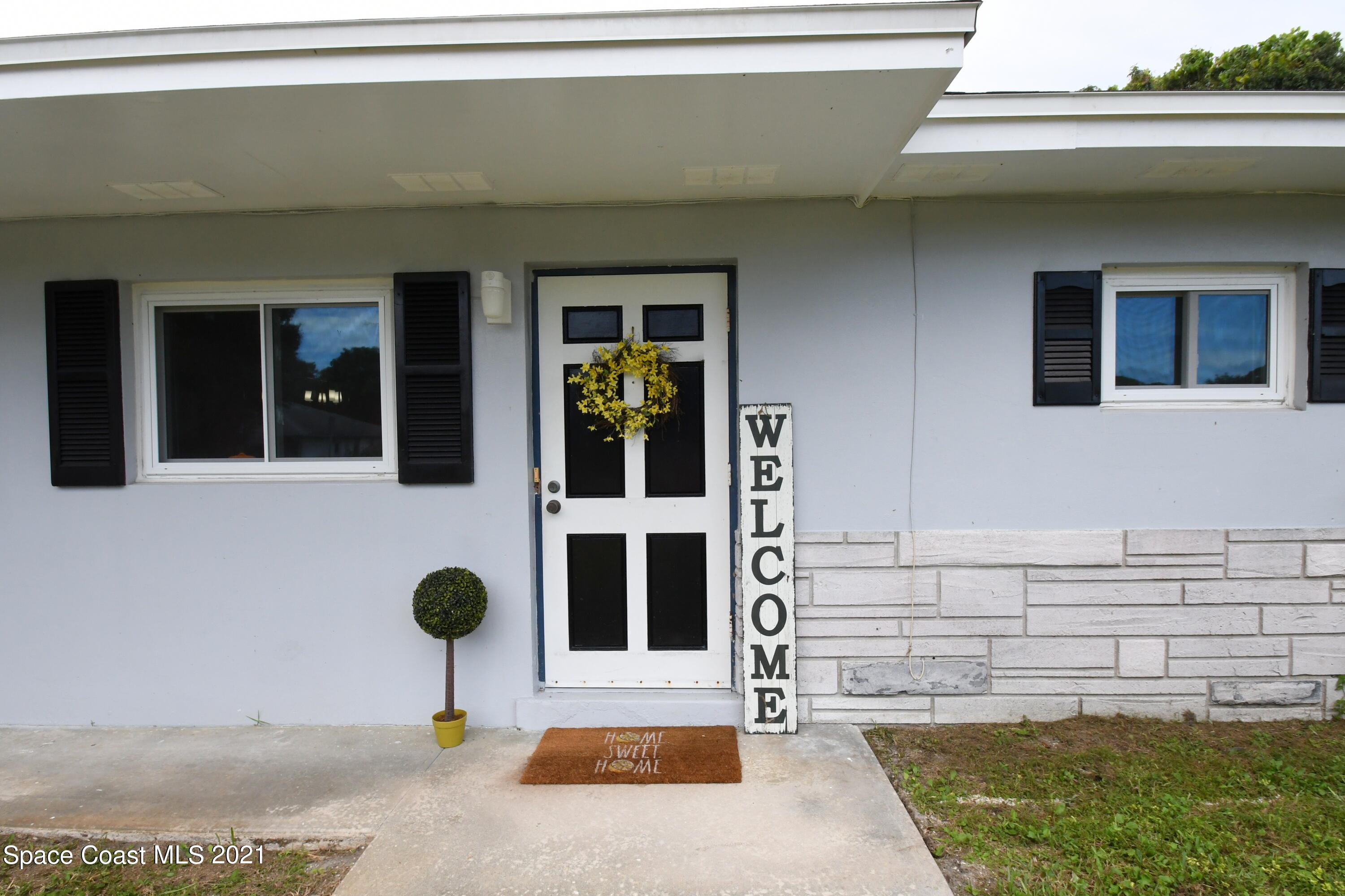 1871 Pinewood Road Melbourne, FL 32934 - Photo 3 of 22 a view of building exterior