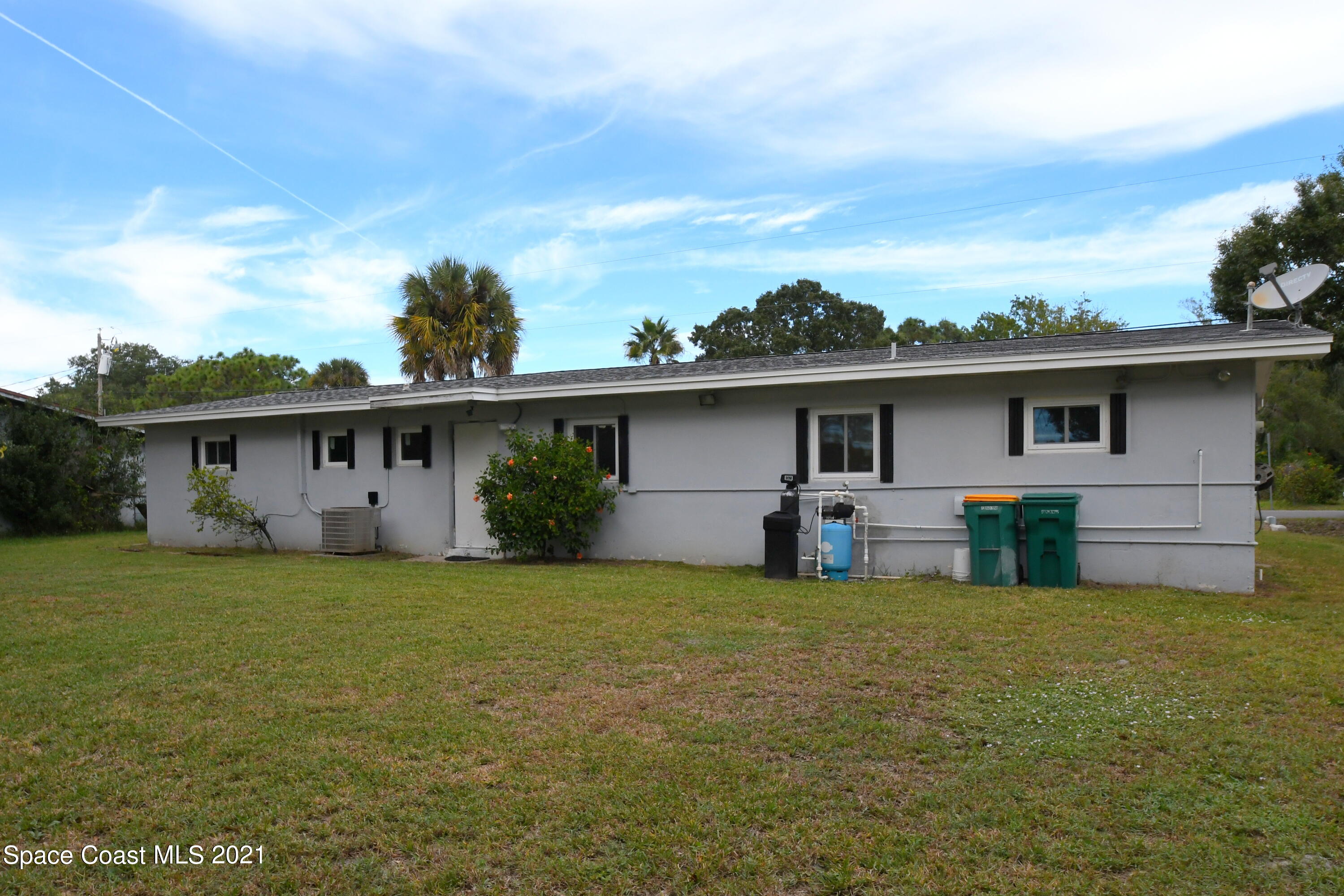 1871 Pinewood Road Melbourne, FL 32934 - Photo 21 of 22 a view of a house with a yard