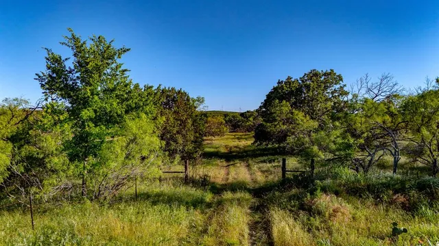 a view of a lake in between the top of a building