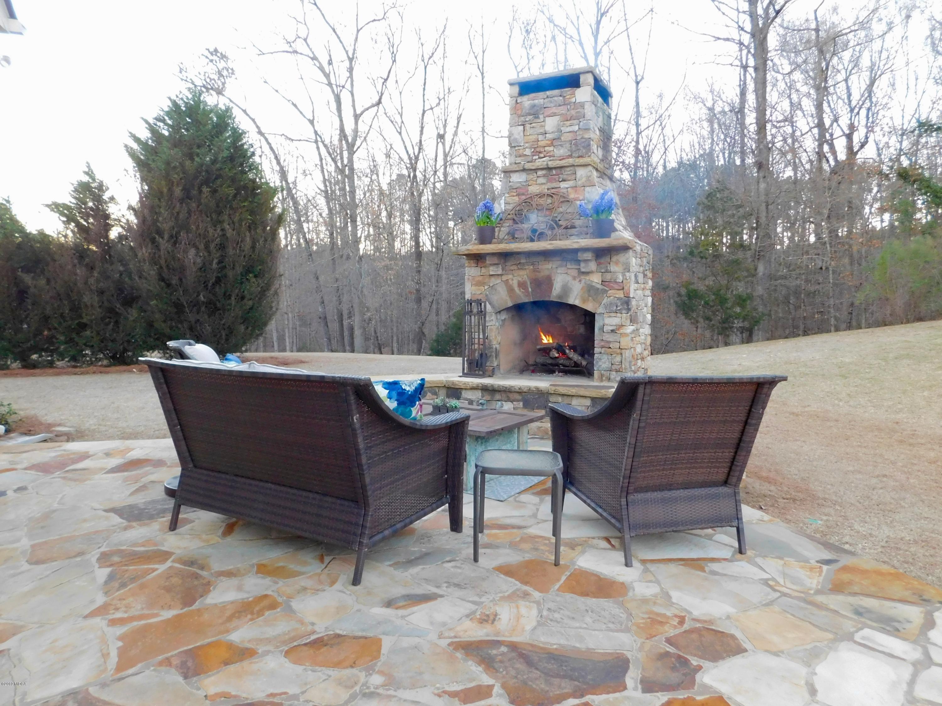 35 Adam Drive Forsyth, GA 31029 - Photo 27 of 31 Backyard Fireplace