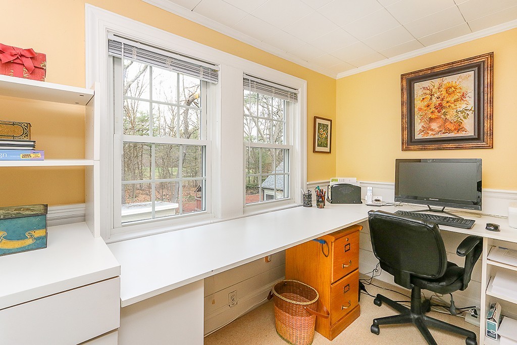 28 Clearwater Road Newton, MA 02462 - Photo 15 of 20 a workspace with furniture and a window