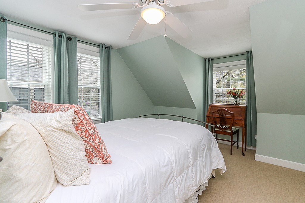 28 Clearwater Road Newton, MA 02462 - Photo 16 of 20 a bedroom with a bed and a window