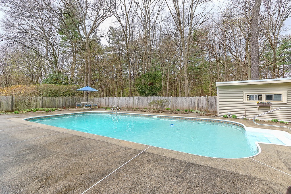 28 Clearwater Road Newton, MA 02462 - Photo 19 of 20 a view of a swimming pool with a patio