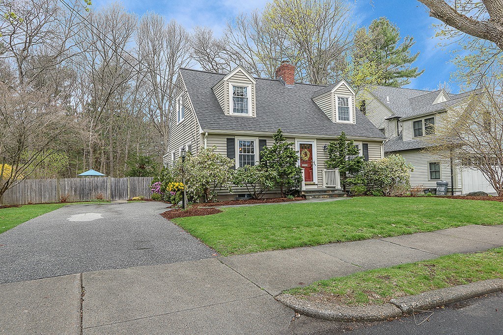 28 Clearwater Road Newton, MA 02462 - Photo 2 of 20 a front view of a house with a garden and plants