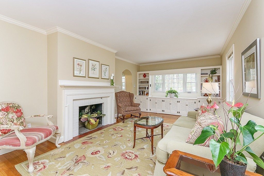 28 Clearwater Road Newton, MA 02462 - Photo 6 of 20 a living room with furniture and a fireplace