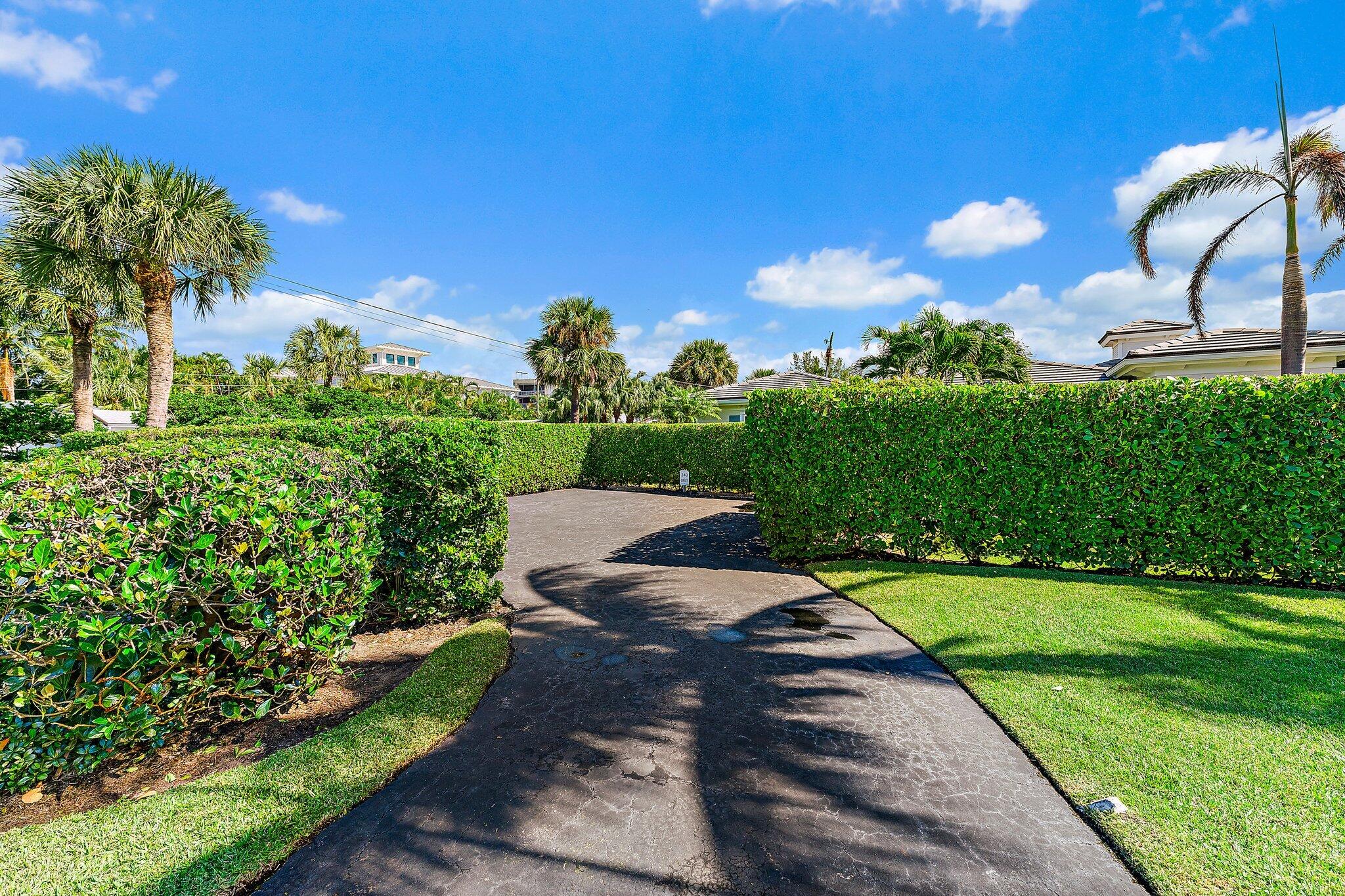 240 Celestial Way, Unit 1 Juno Beach, FL 33408 - Photo 48 of 49 Driveway to Guest Parking