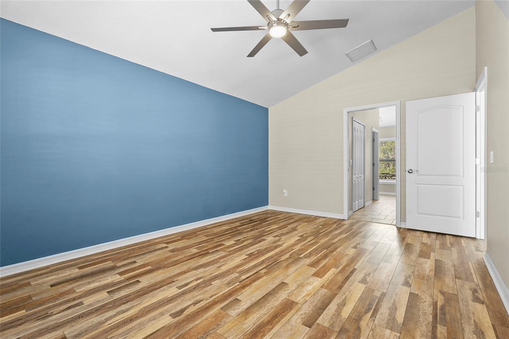 15105 Gulistan Avenue Port Charlotte, FL 33953 - Photo 17 of 39 a view of empty room with wooden floor