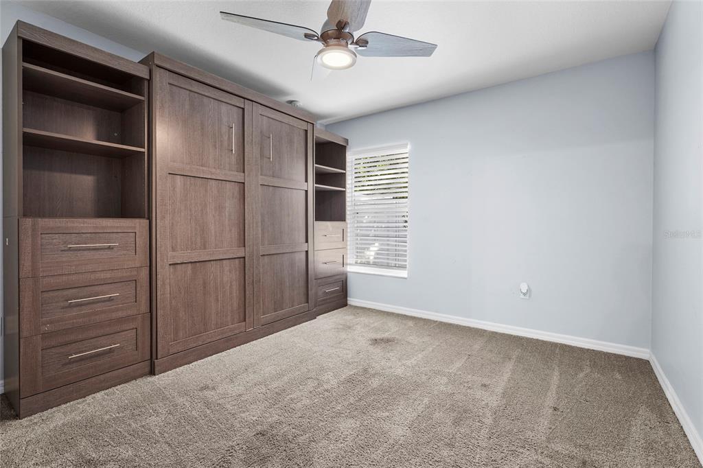 15105 Gulistan Avenue Port Charlotte, FL 33953 - Photo 20 of 39 a view of an empty room with a window