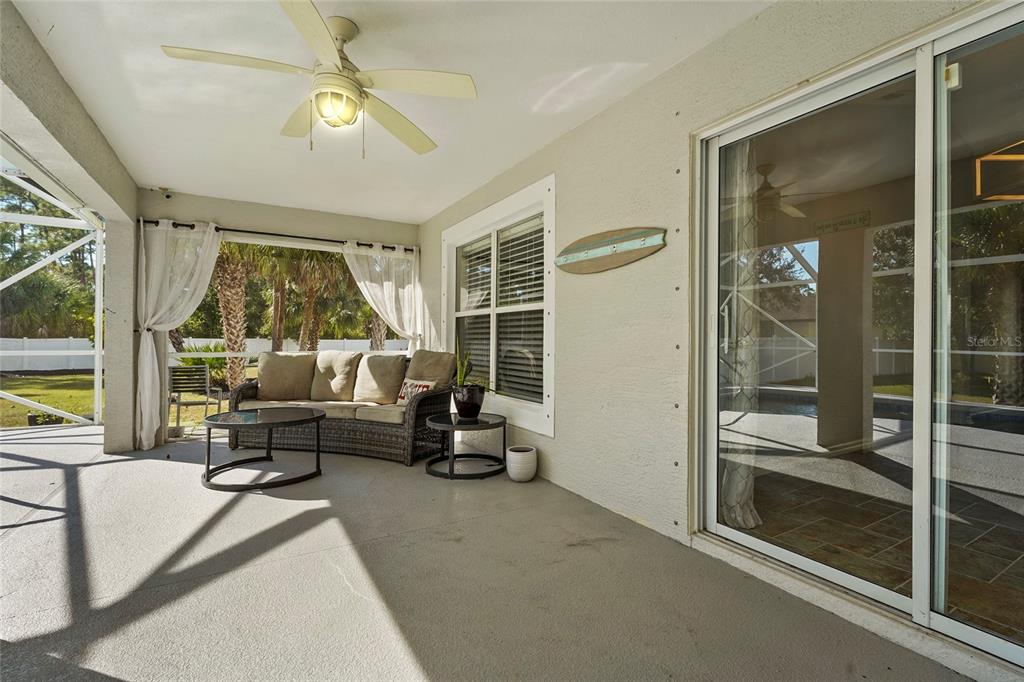 15105 Gulistan Avenue Port Charlotte, FL 33953 - Photo 28 of 39 a living room with furniture and a large window