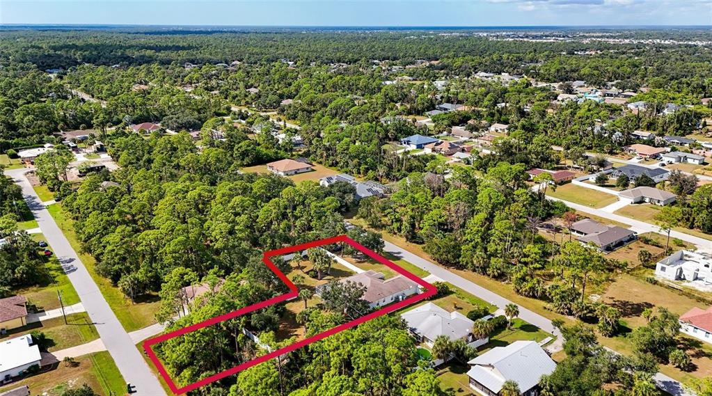 15105 Gulistan Avenue Port Charlotte, FL 33953 - Photo 37 of 39 an aerial view of a houses