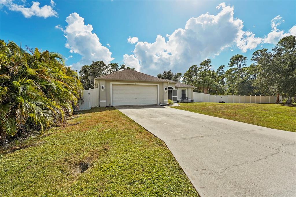 15105 Gulistan Avenue Port Charlotte, FL 33953 - Photo 5 of 39 a view of a swimming pool with an outdoor space