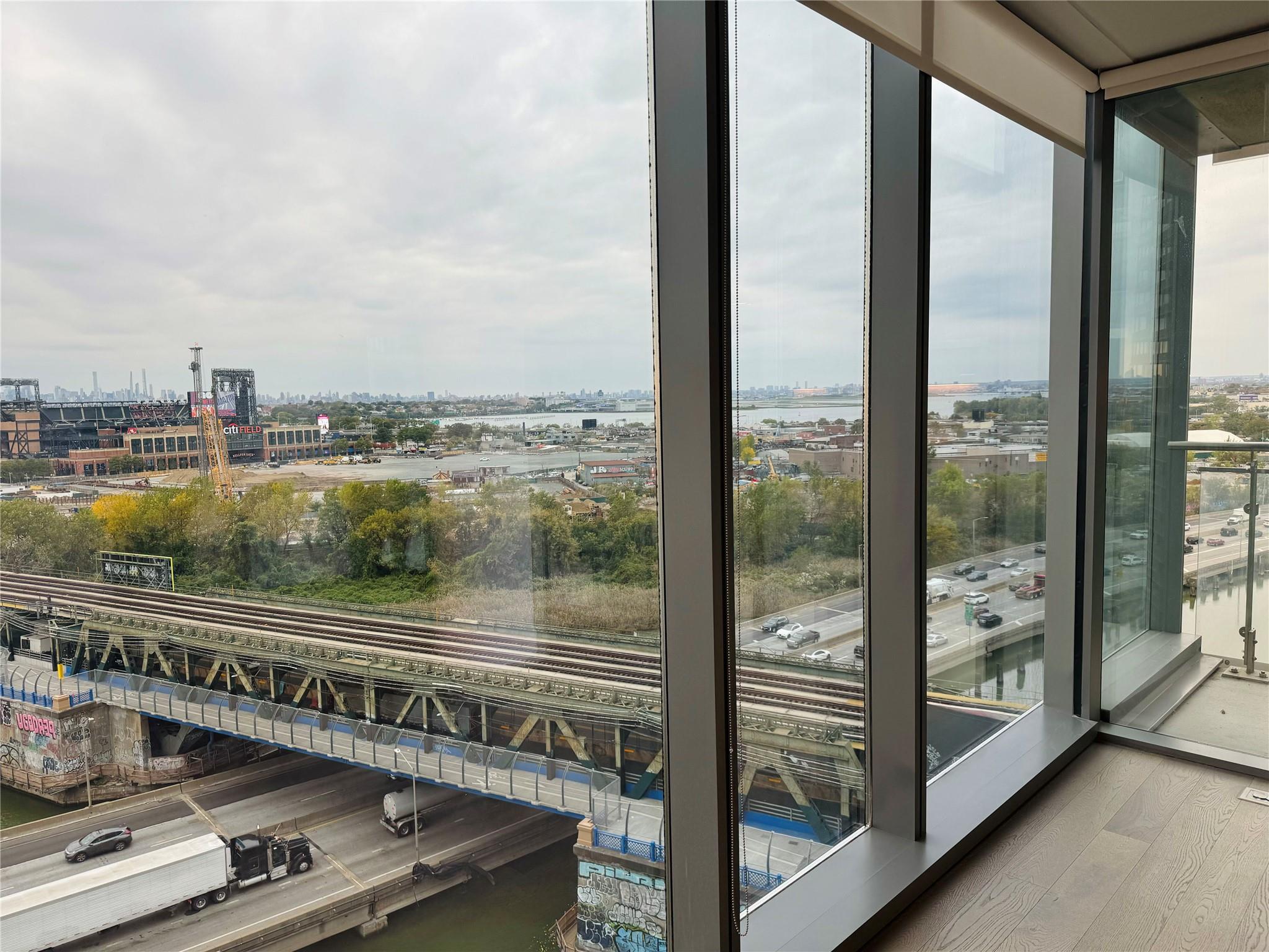 a view of a city from a balcony