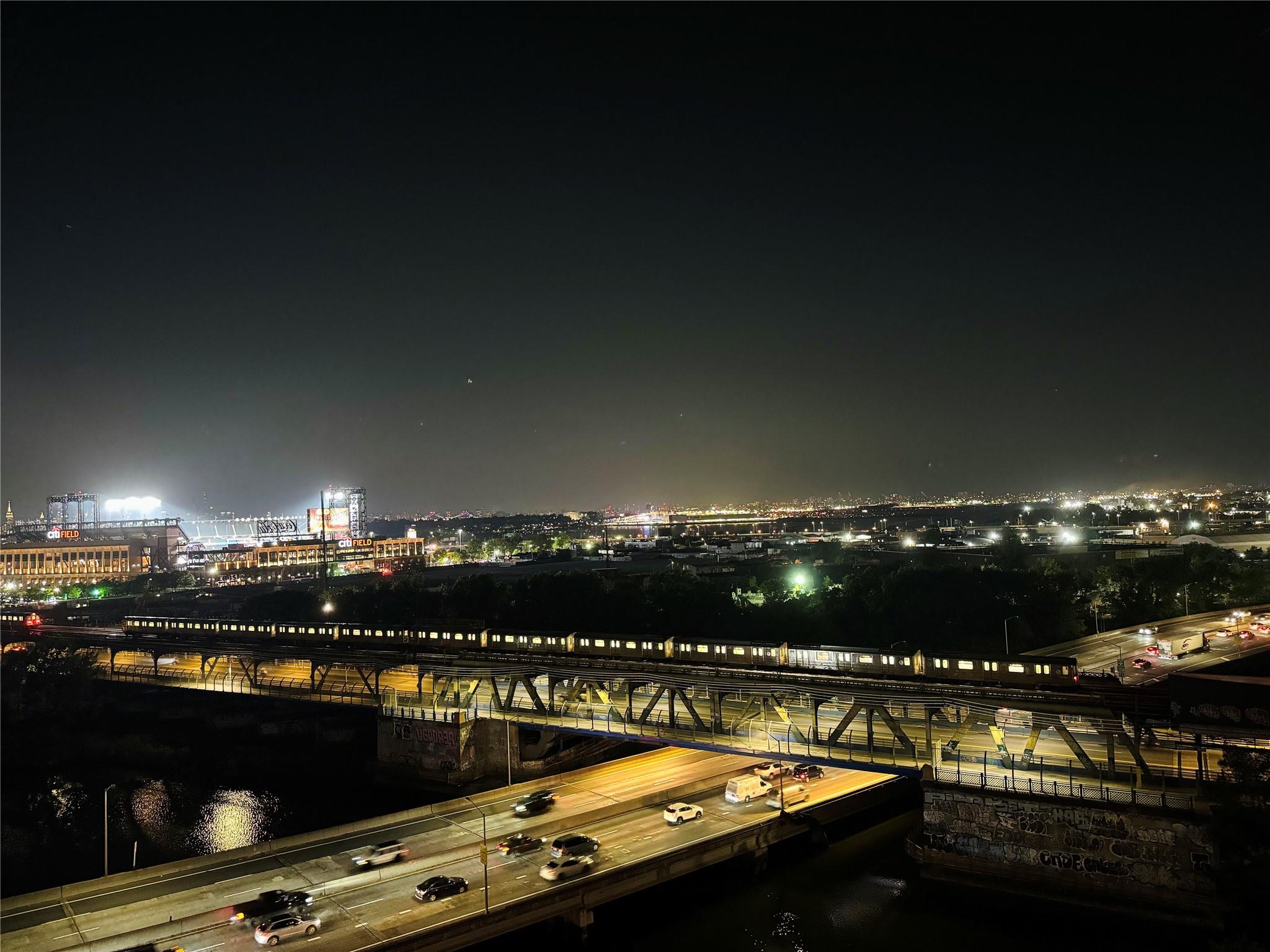 131-01 40 Road, Unit 11M Queens, NY 11354 - Photo 6 of 12 a view of a swimming pool and city view