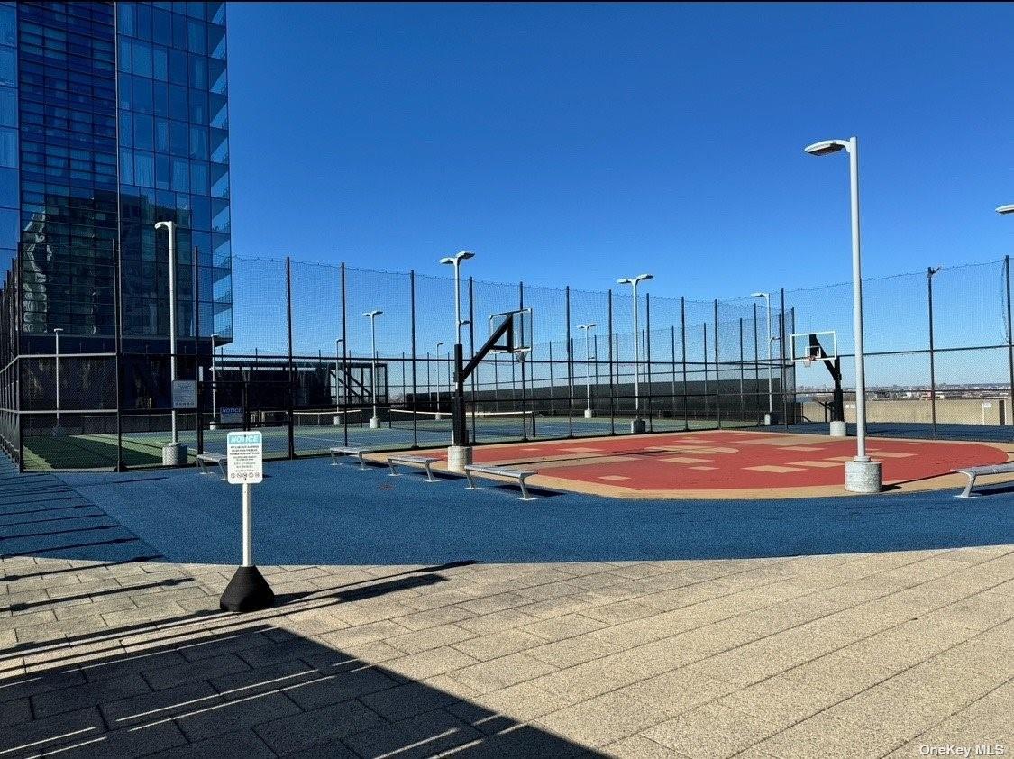 131-01 40 Road, Unit 11M Queens, NY 11354 - Photo 9 of 12 a view of swimming pool