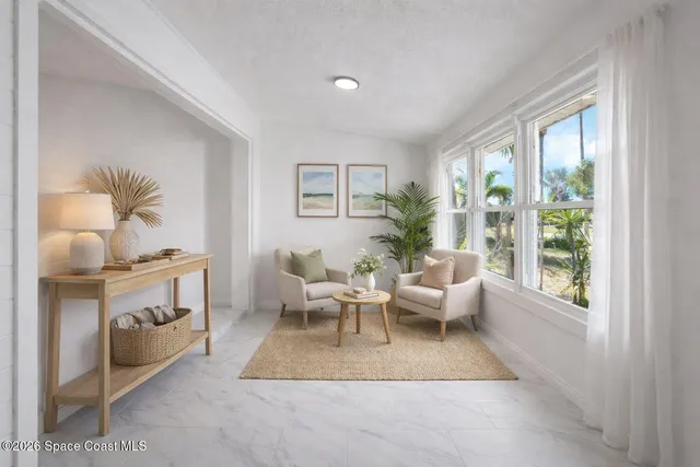 a kitchen with stainless steel appliances granite countertop a stove a refrigerator and a microwave