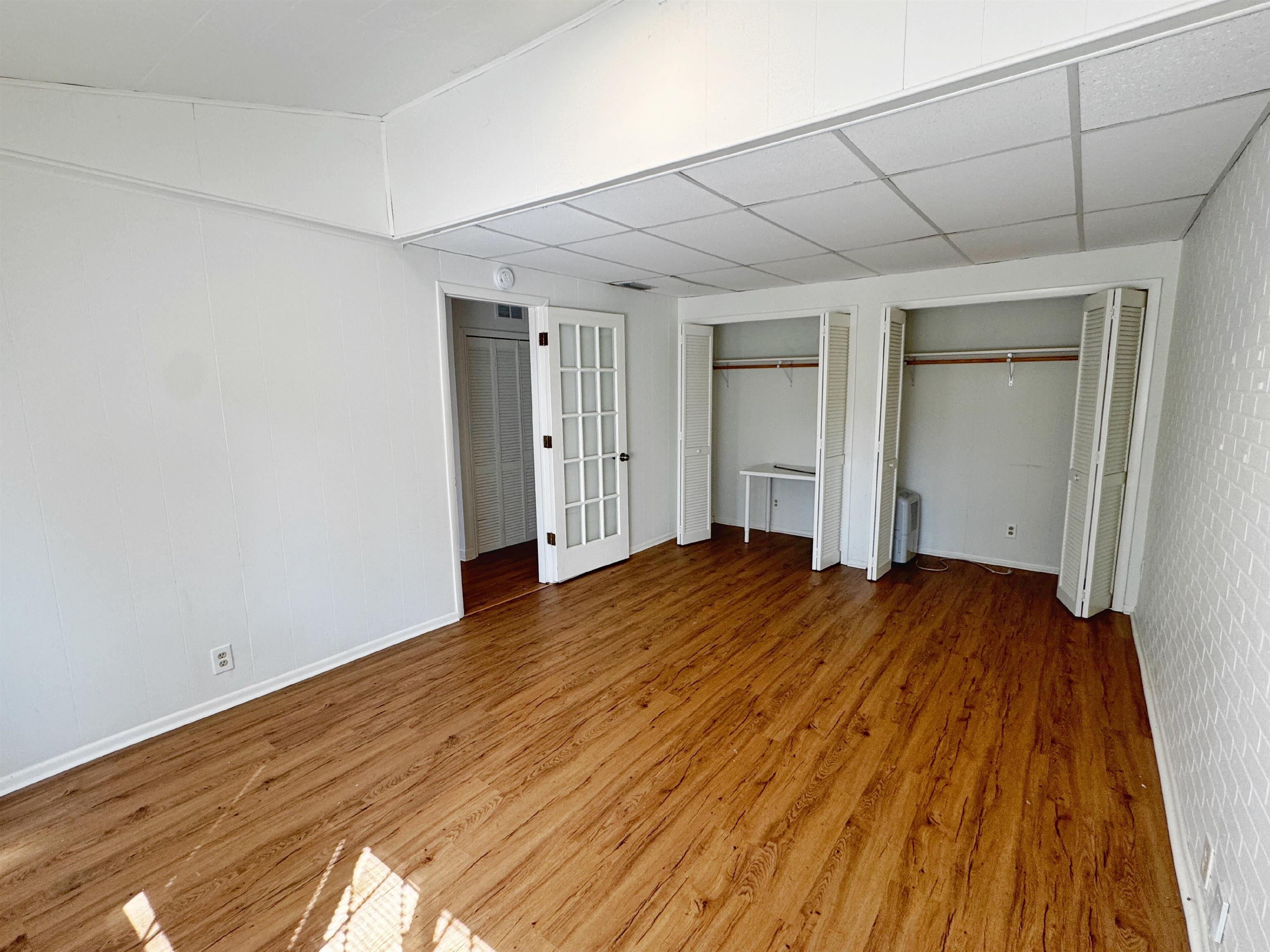 20 Macaris Street St. Augustine, FL 32084 - Photo 19 of 29 wooden floor in an empty room