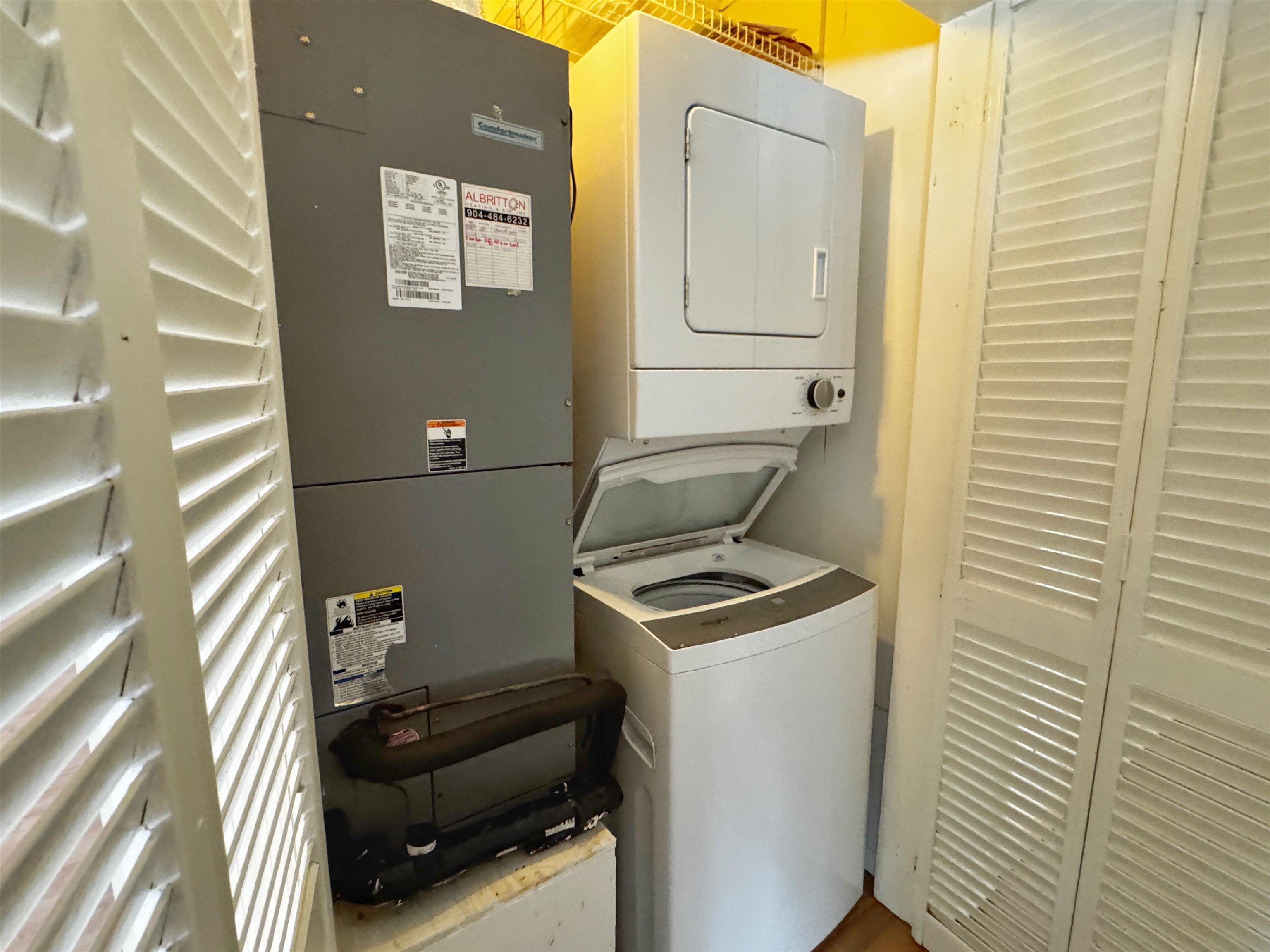 20 Macaris Street St. Augustine, FL 32084 - Photo 24 of 29 a utility room with dryer and washer