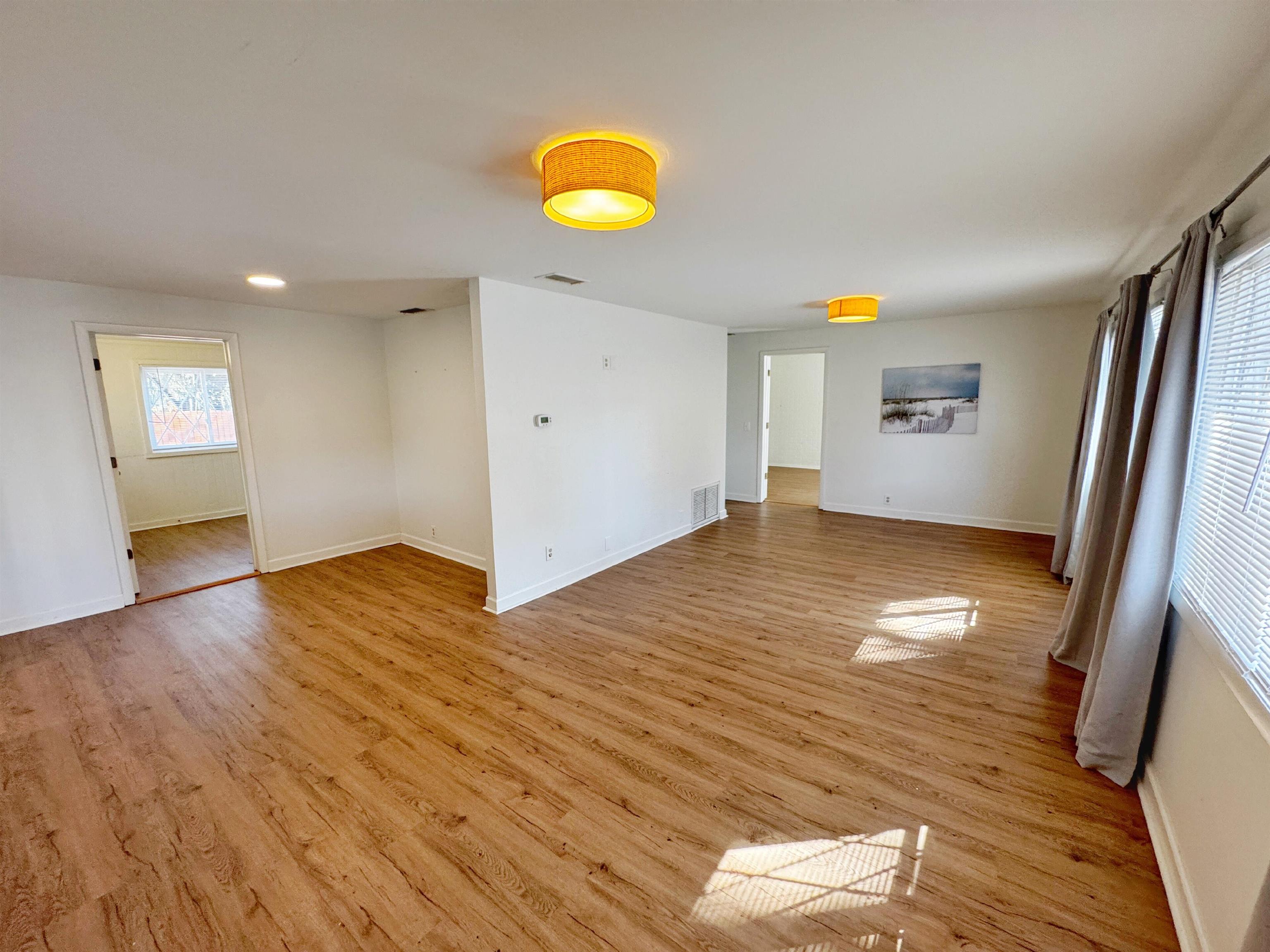 20 Macaris Street St. Augustine, FL 32084 - Photo 3 of 29 a view of empty room with wooden floor