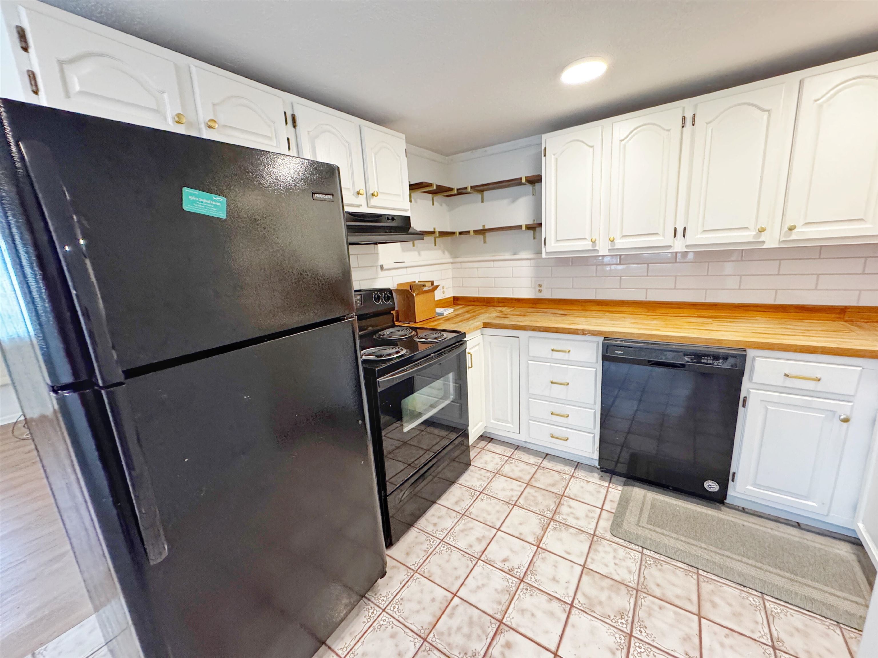 20 Macaris Street St. Augustine, FL 32084 - Photo 7 of 29 a kitchen with stainless steel appliances a refrigerator sink and cabinets