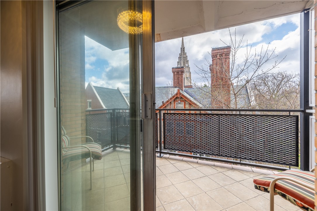 1000 East Avenue, Unit UN301 Rochester, NY 14607 - Photo 22 of 38 Slider from kitchen to balcony