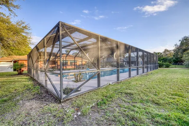 a view of outdoor space with garden and deck