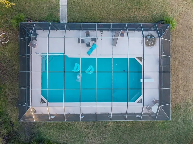 a view of a room with a wooden fence
