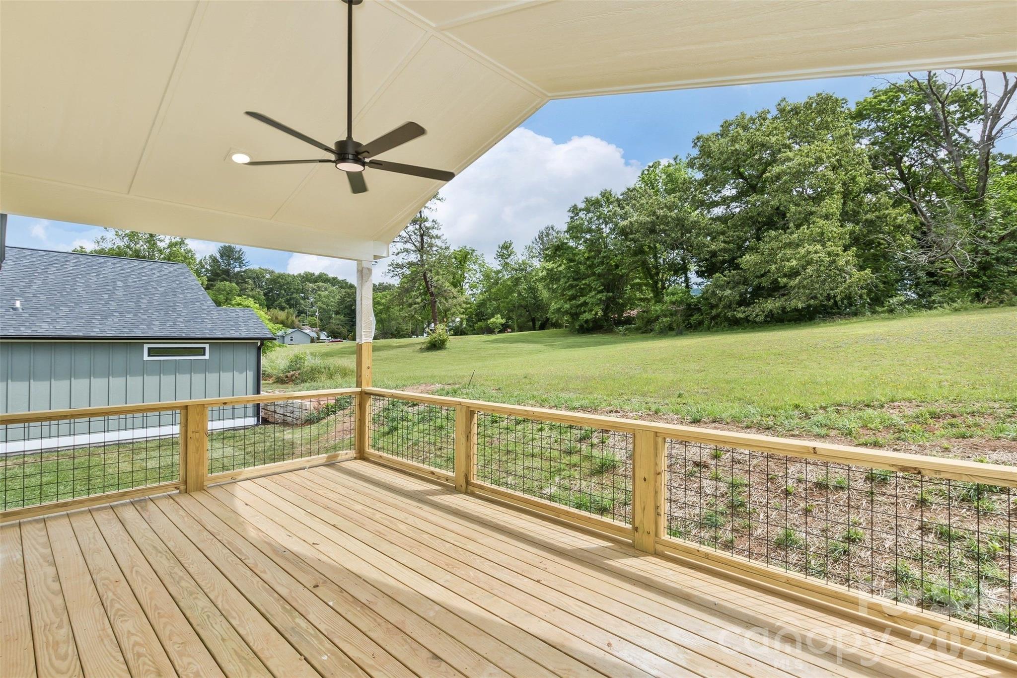 112 Peyton Elaine Road Clyde, NC 28721 - Photo 11 of 35 a view of a terrace with wooden floor and fence