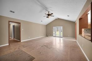 10235 White Rock Road Conroe, TX 77306 - Photo 20 of 25 a view of an empty room with a window