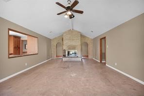 10235 White Rock Road Conroe, TX 77306 - Photo 7 of 25 a view of an empty room with a window