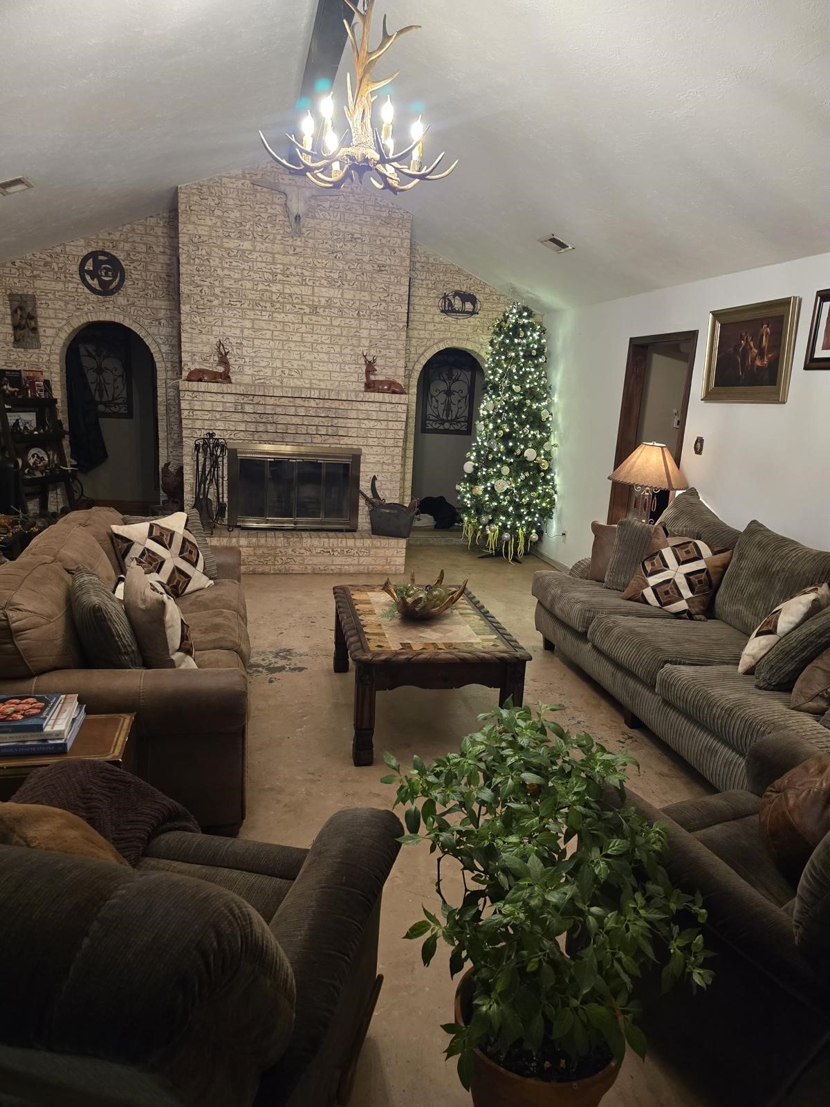 10235 White Rock Road Conroe, TX 77306 - Photo 9 of 25 a living room with furniture and a fireplace