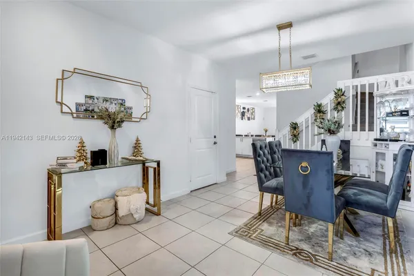 a view of a dining room with furniture