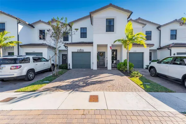 a car parked in front of a house