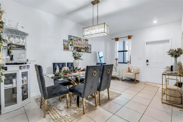 a view of a dining room with furniture