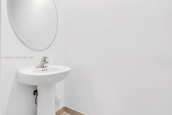 a sink with a mirror