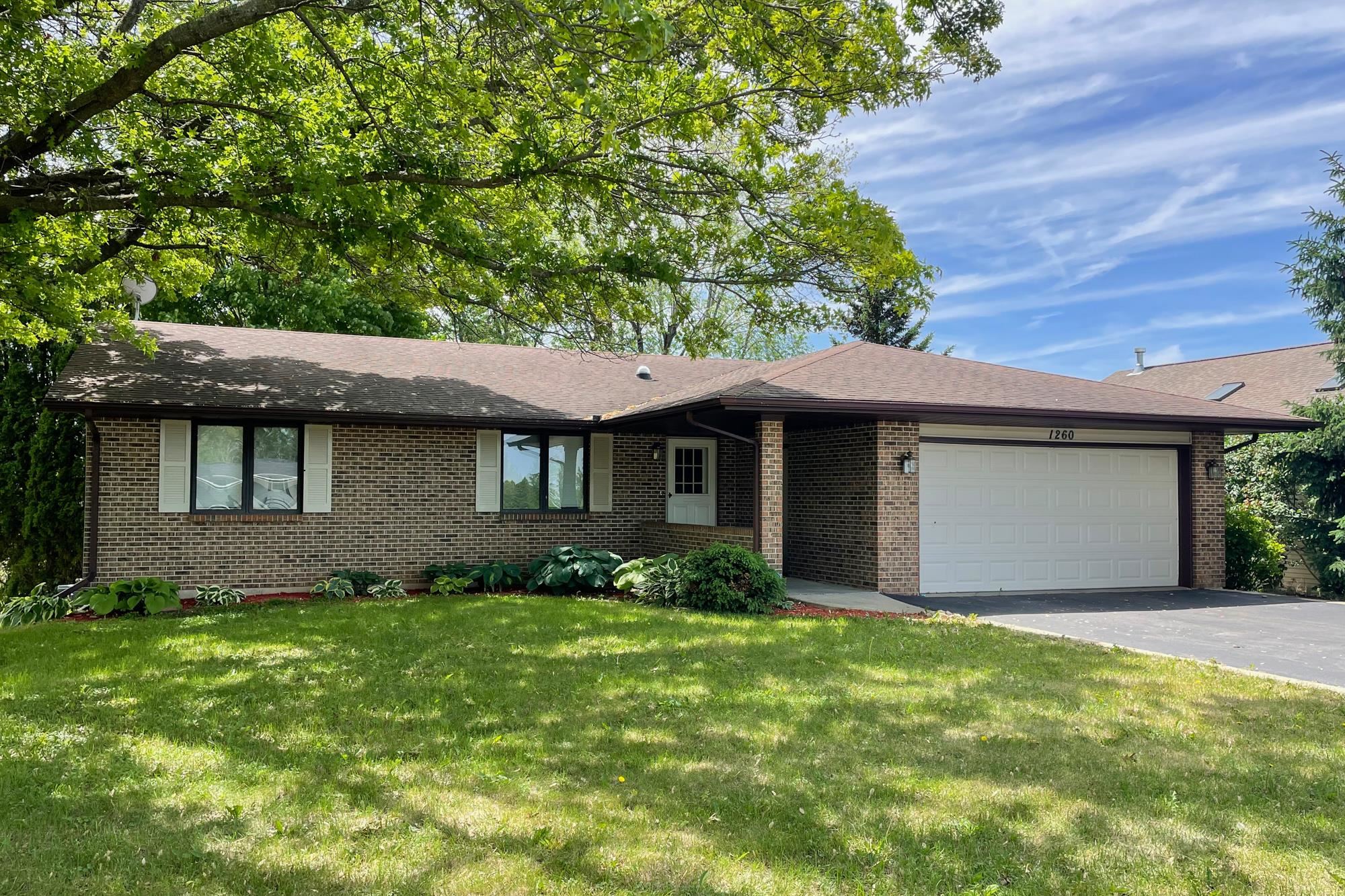 1260 Lake Summerset Road Davis, IL 61019 - Photo 1 of 24 a front view of a house with a garden