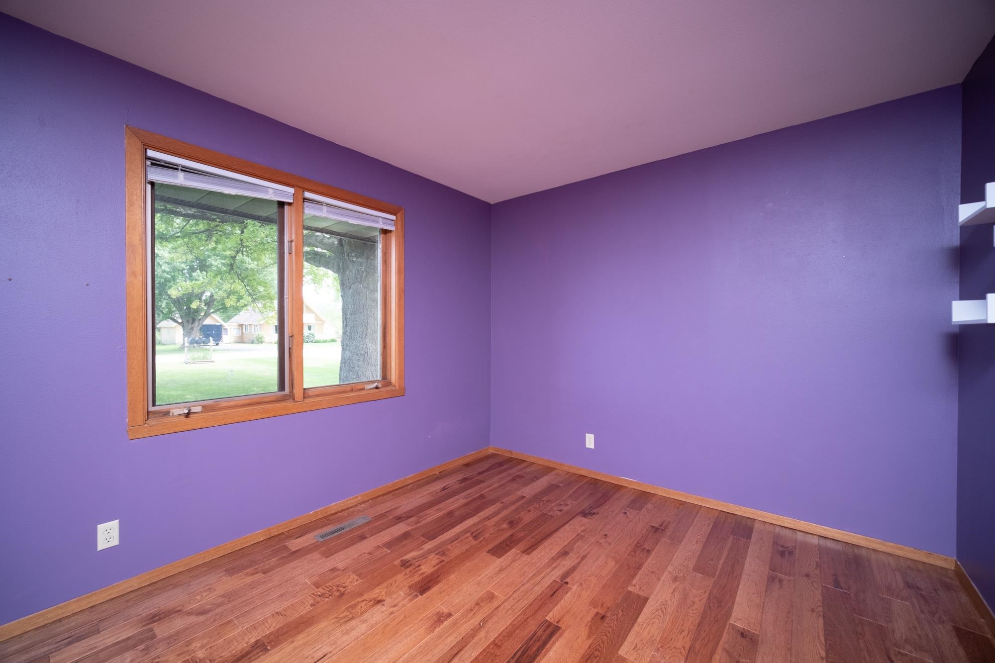 1260 Lake Summerset Road Davis, IL 61019 - Photo 15 of 24 a view of empty room with wooden floor and fan