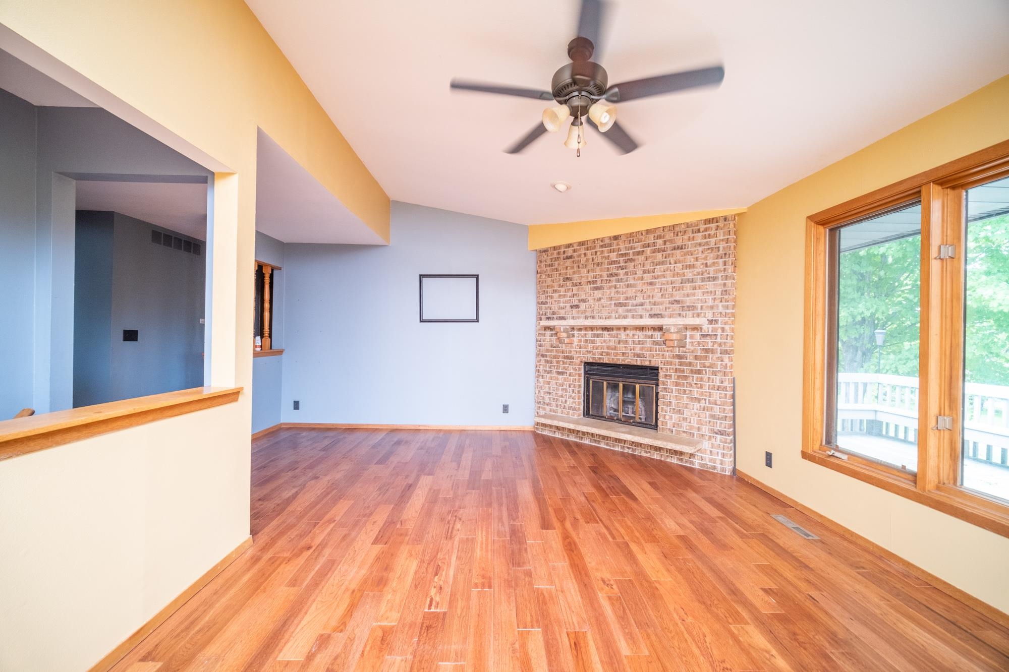 1260 Lake Summerset Road Davis, IL 61019 - Photo 4 of 24 a view of an empty room with a fireplace and a window