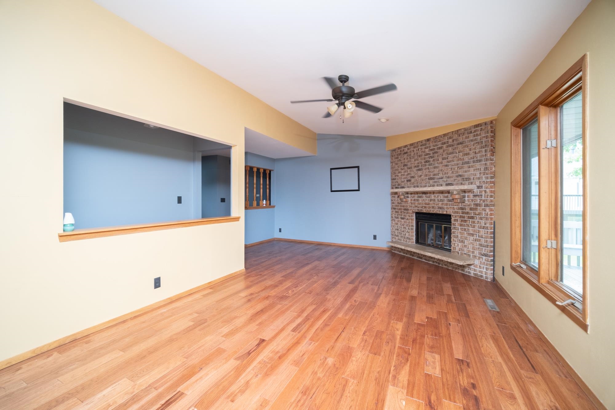 1260 Lake Summerset Road Davis, IL 61019 - Photo 5 of 24 a view of empty room with wooden floor and fireplace