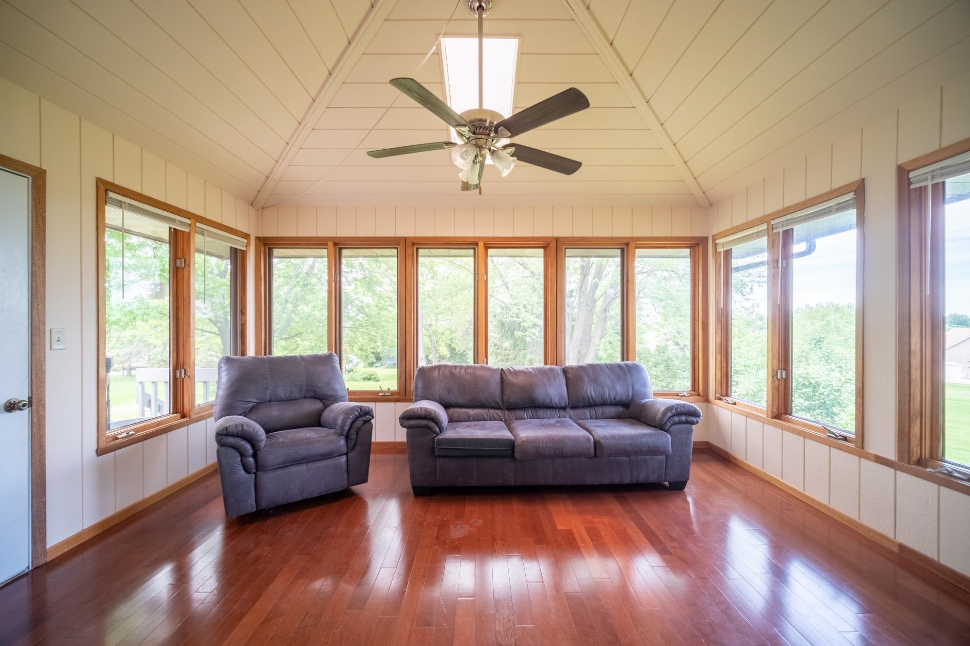 1260 Lake Summerset Road Davis, IL 61019 - Photo 9 of 24 a living room with furniture and a large window