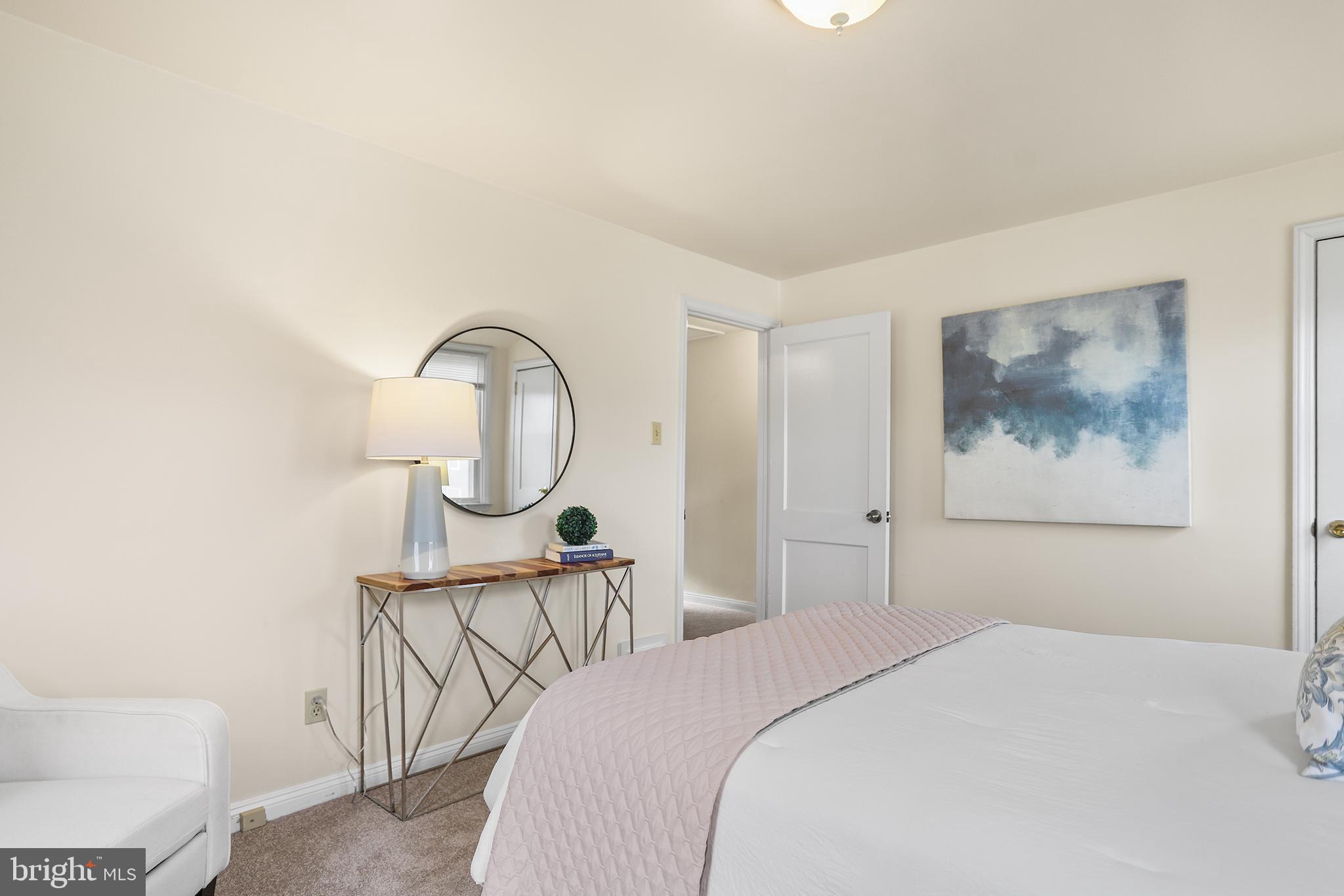 357 Cedar Avenue Holmes, PA 19043 - Photo 11 of 20 a bedroom with a bed and a painting on the wall
