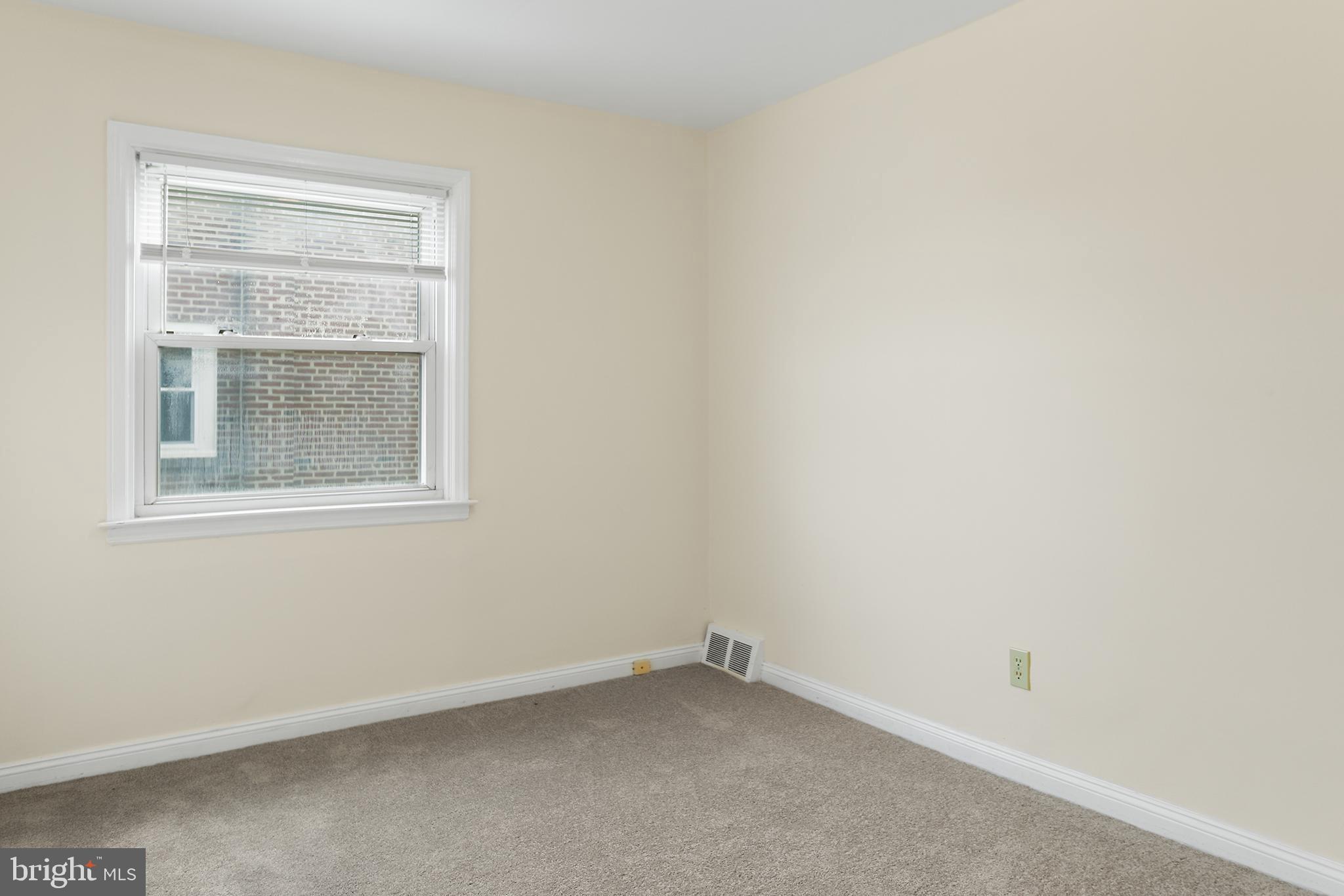 357 Cedar Avenue Holmes, PA 19043 - Photo 13 of 20 an empty room with a window