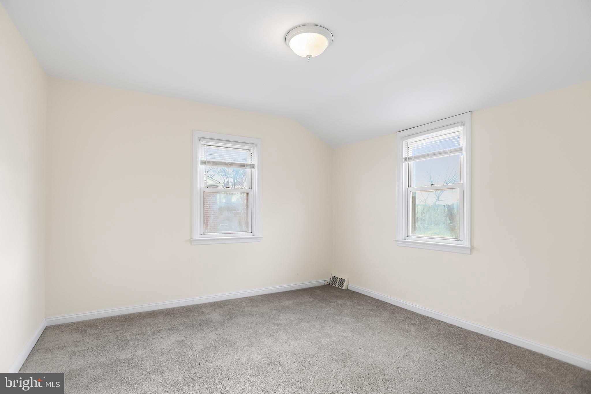 357 Cedar Avenue Holmes, PA 19043 - Photo 15 of 20 an empty room with a window