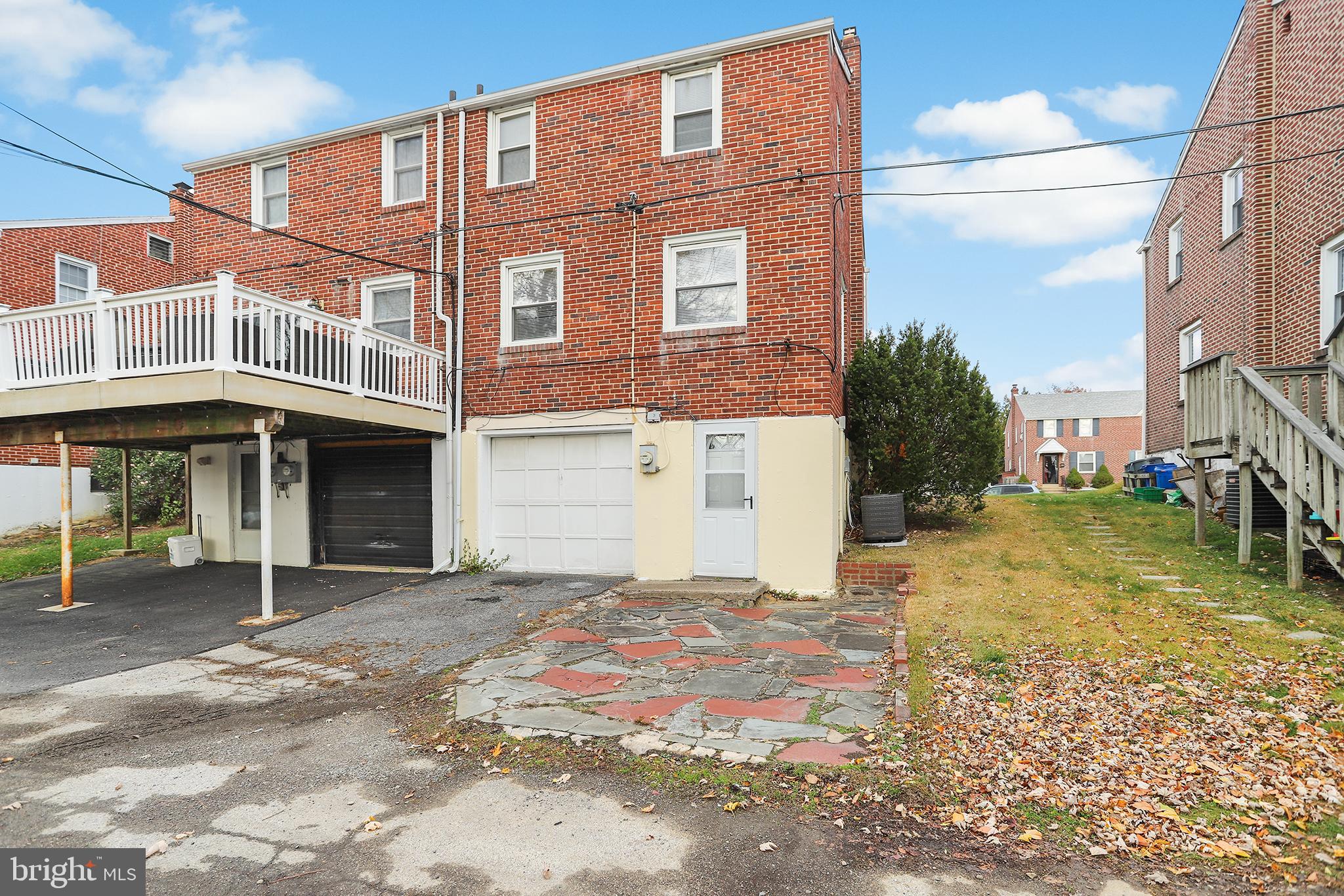 357 Cedar Avenue Holmes, PA 19043 - Photo 20 of 20 a front view of a building with a garden