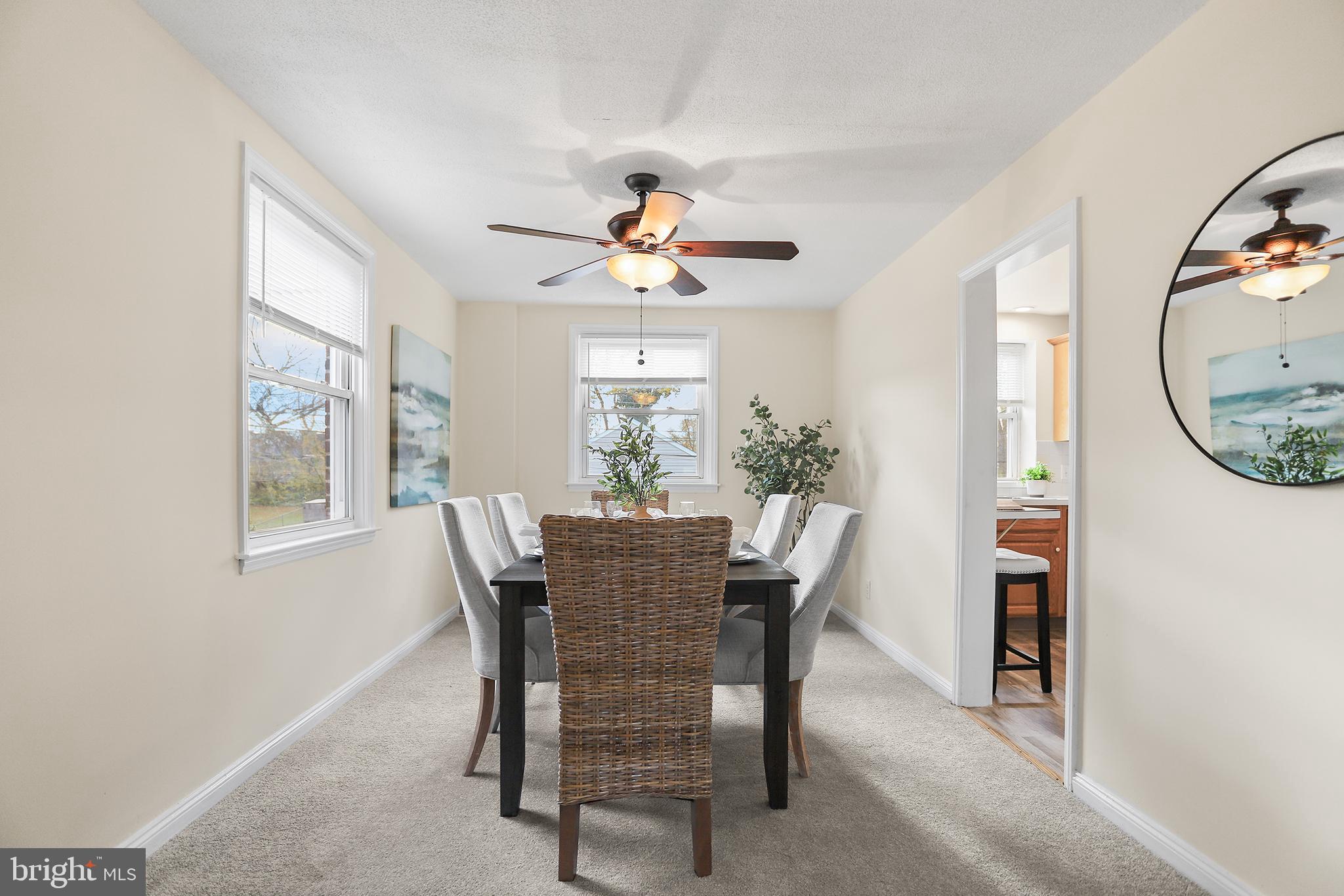357 Cedar Avenue Holmes, PA 19043 - Photo 7 of 20 a dining room with furniture a chandelier and window