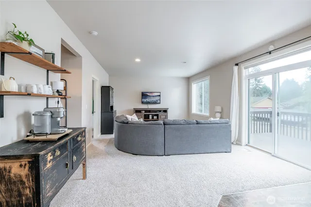 a living room with furniture and a couch
