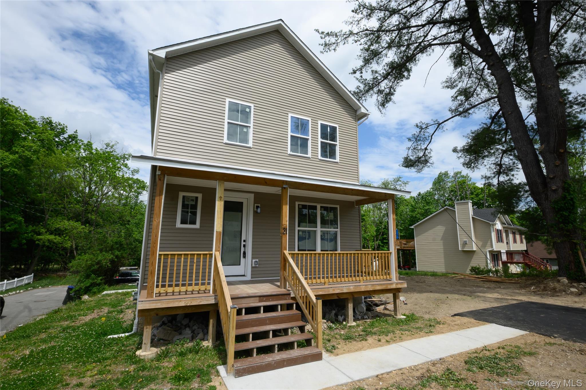 81 Silver Lake Sctn Road Middletown, NY 10940 - Photo 2 of 37 a view of a house with backyard and a tree