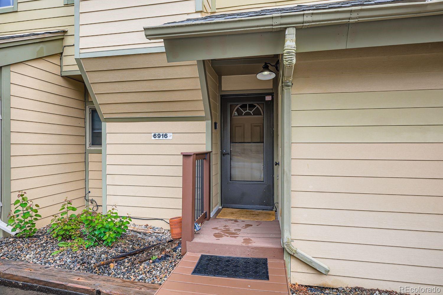 6916 Ryan Gulch Road, Unit 6916 Silverthorne, CO 80498 - Photo 3 of 33 a view of a entryway door of the house