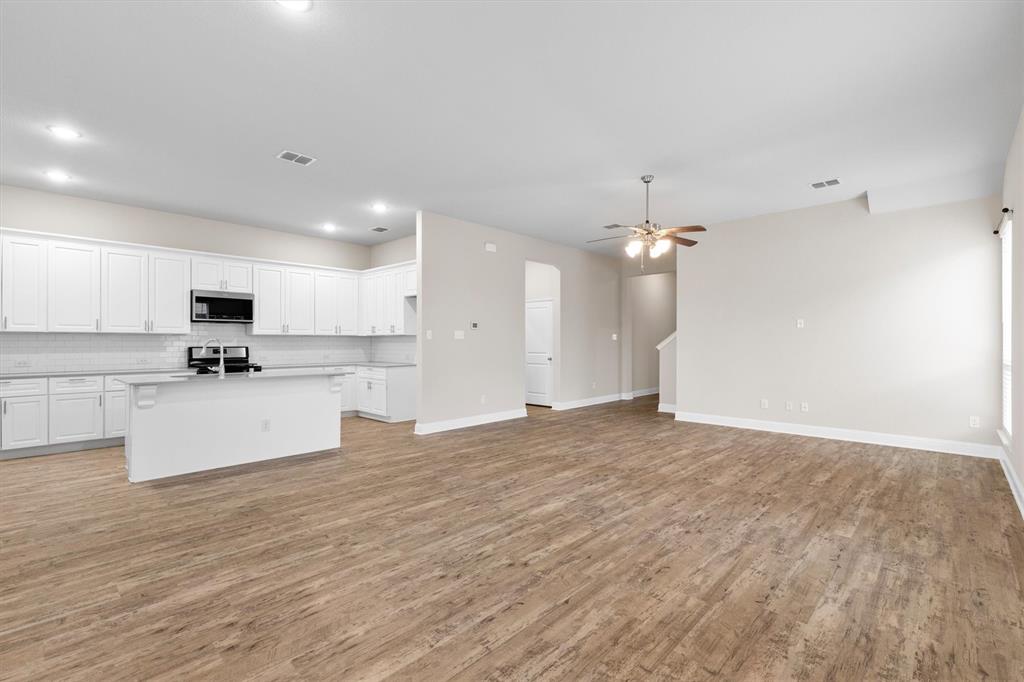 576 Spruce Trail Forney, TX 75126 - Photo 9 of 39 Dining area looking at the living room & kitchen
