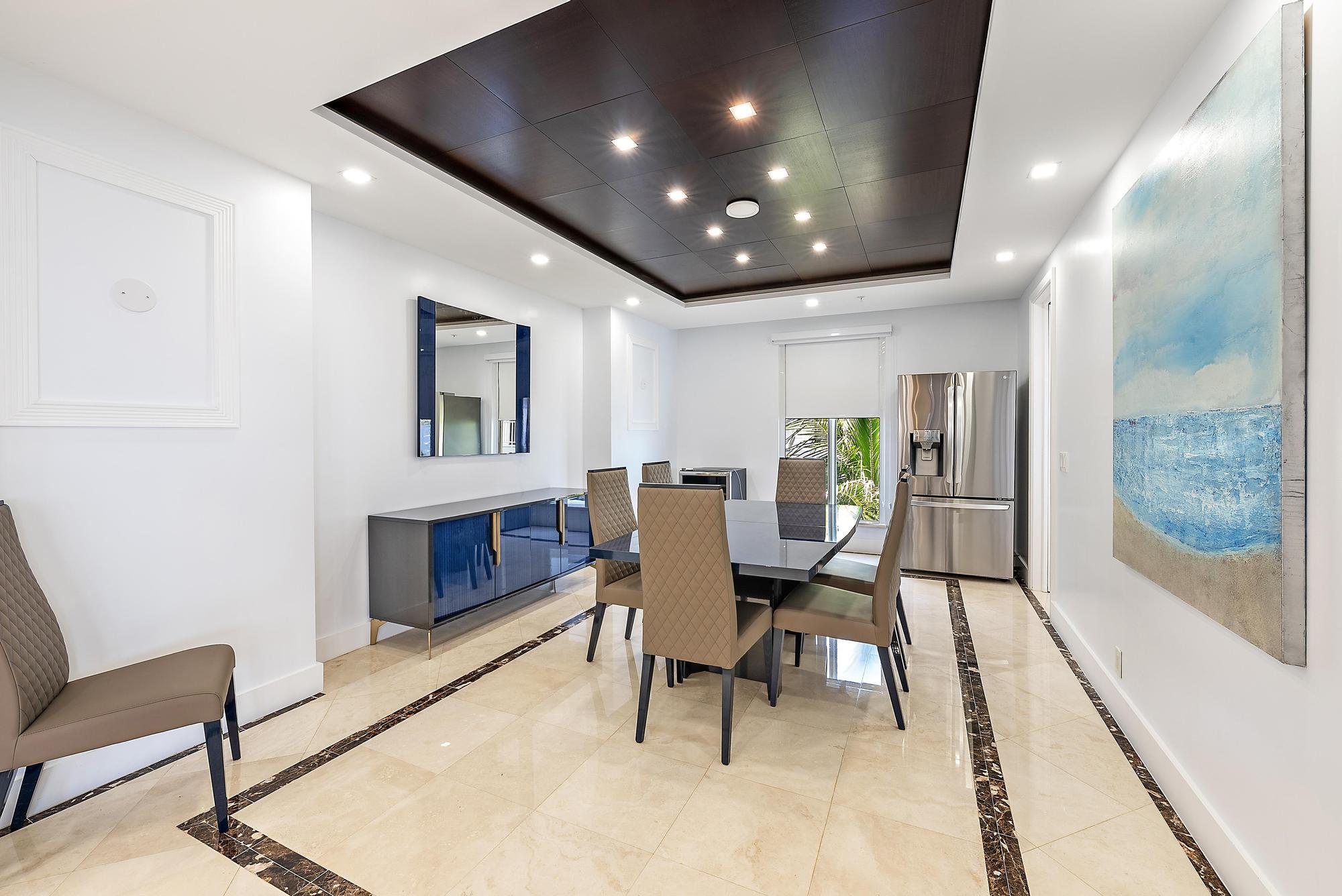 Undisclosed Address Boca Raton, FL 33431 - Photo 11 of 47 a view of a dining room with furniture window and wooden floor